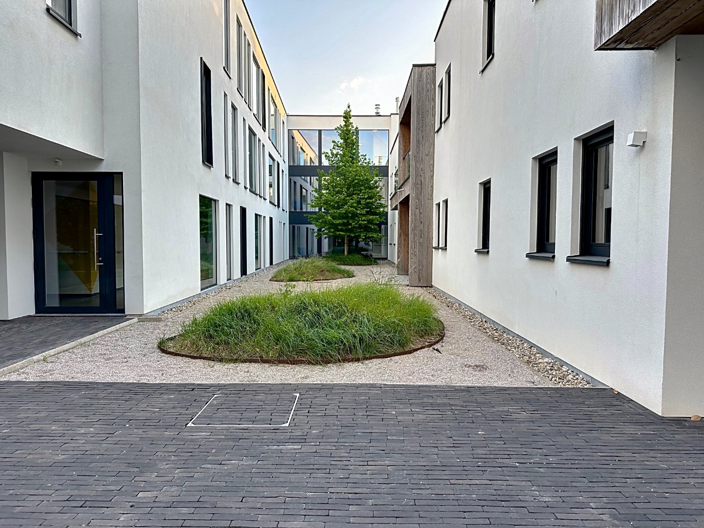 Stijlvol gelijkvloers appartement met gemeenschappelijke tuin 