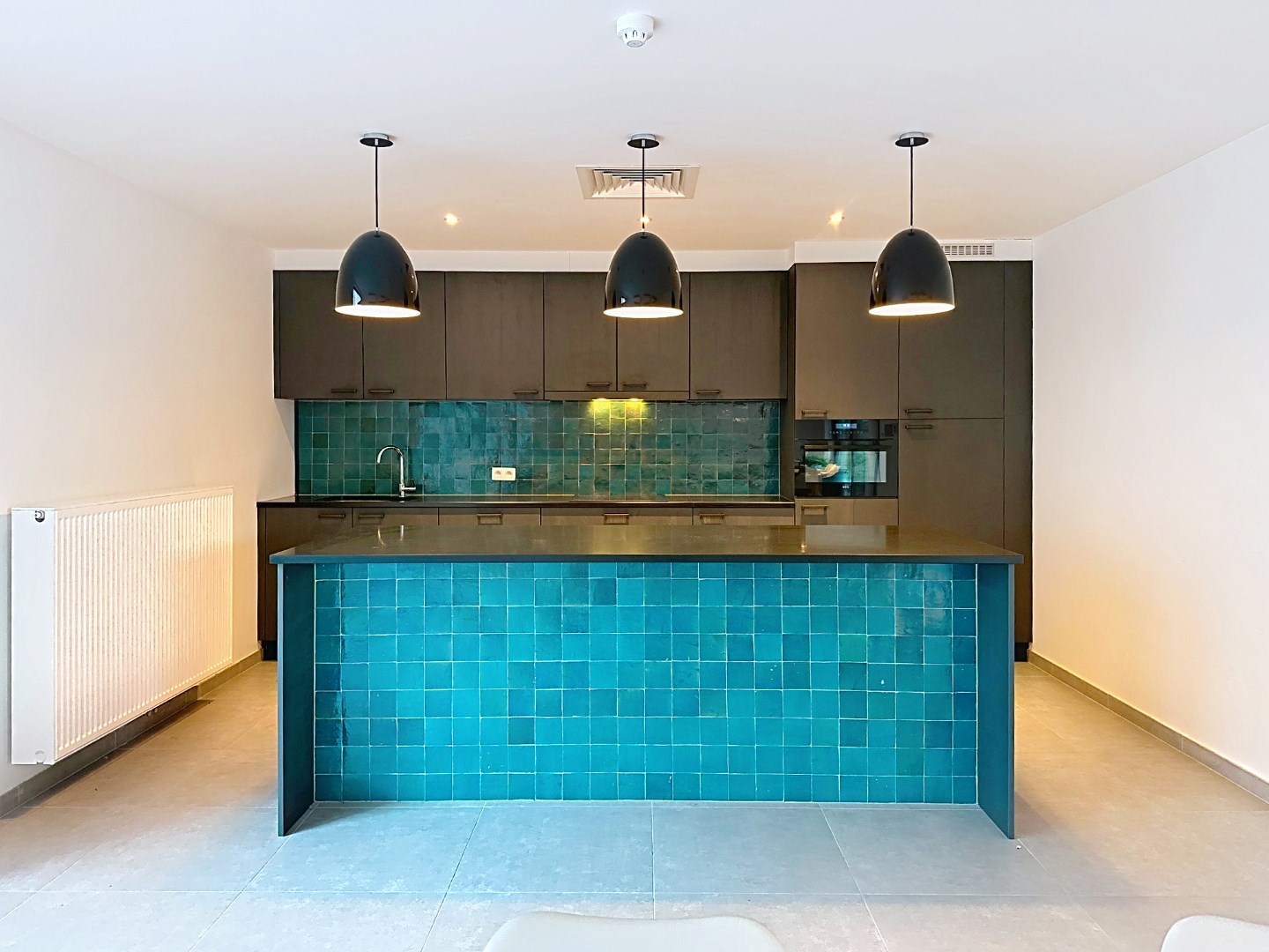 Stijlvol gelijkvloers appartement met gemeenschappelijke tuin 